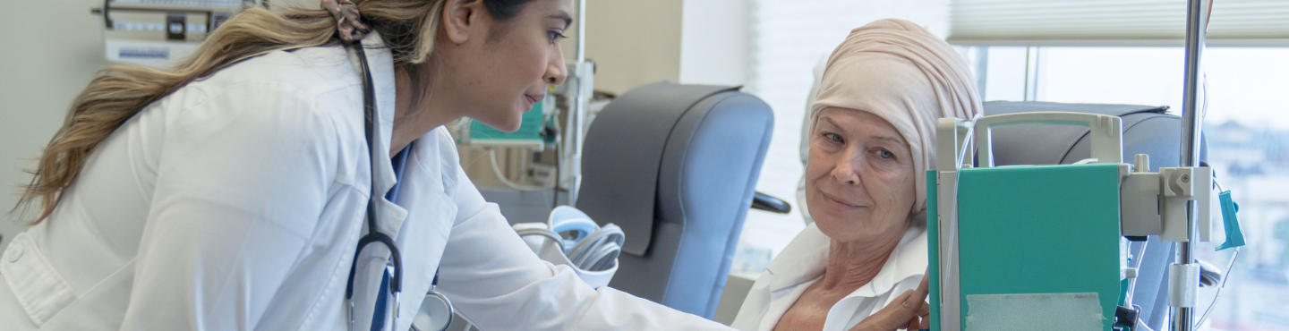 Older, sick woman, cared for by doctor