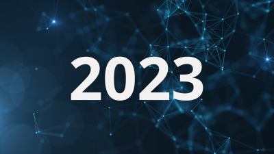A dark blue background displays the text, "2023," in a light grey, bold font